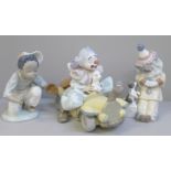 Two Lladro figures of clowns, clown in car a/f and a Lladro figure of a young baseball player on one