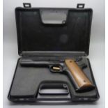 An Italian automatic Bruni 96 8mm cal. target shooting pistol, cased