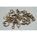 A collection of clasps and clips including silver