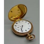 A gold plated full hunter pocket watch with long service inscription to inner cuvette