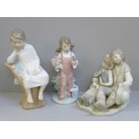A Lladro figure group and two other Lladro figures