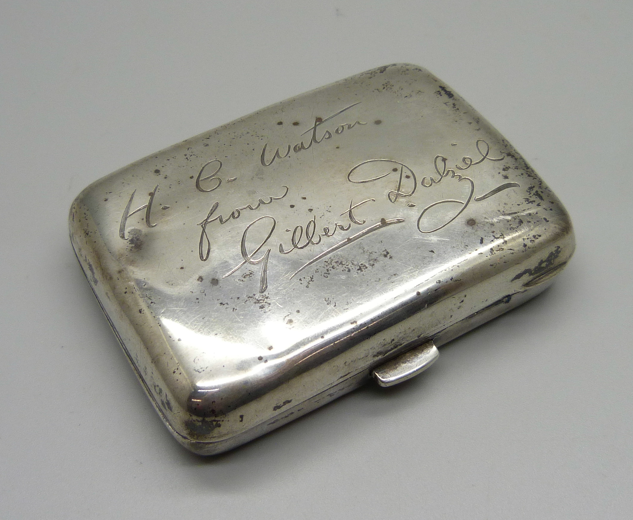 A Victorian silver cigarette case with inscription, 84g, and a collection of pen nibs