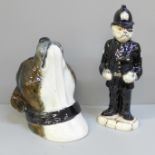 A Manor Collectables Sgt. Mog figure and Staffordshire Bull Terrier wall mounted plaque