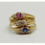 A Victorian 18ct gold triple ring set with diamonds, a sapphire and a ruby, (three rings placed