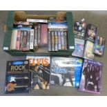 A box of rock VHS videos, Queen, David Bowie, Sex Pistols, Pink Floyd and music books (learn to play