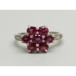 A 9ct gold and tourmaline cluster ring with diamond shoulders, 3.2g, N
