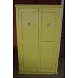 An early 20th Century painted pine housekeeper's cupboard