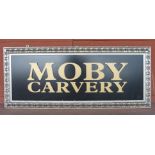 A Moby Carvery double sided sign