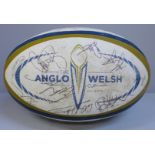 A signed Anglo Welsh Cup rugby match ball