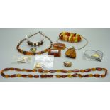 A collection of silver and amber jewellery