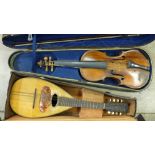 A violin and a mandolin, cased, a/f, violin back 36cm without button