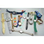 A collection of wristwatches including children's and Swatch