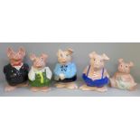 A set of five Wade Nat West pig money banks, all with stoppers
