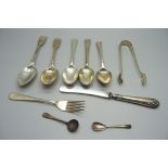 A collection of silver cutlery and sugar tongs, 195g