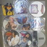 A collection of picture disc records including Elvis Presley, Wham, Tina Turner, Spandau Ballet,