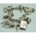 A silver charm bracelet, 54g