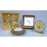 An Imhof desk clock, an 8-days clock, Cyma Amic clock and a travel clock