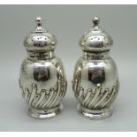 A pair of silver peppers, fluted decoration, Birmingham 1893, 77g