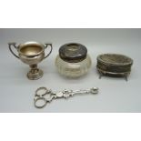 A small silver trophy, silver sugar nips, a silver topped pot, a/f and a silver casket, 120g