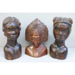 Three carved hardwood busts; two African and one South East Asian