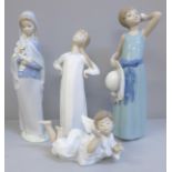 Four Lladro figures of children