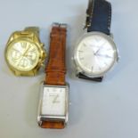 Three designer wristwatches, two Michael Kors, one Emporio Armani