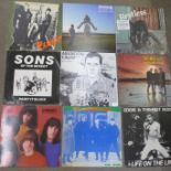 Twelve LP records and 12" singles, punk and new wave