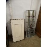 Five Art Deco stained glass window panes and a pair of painted wooden panels