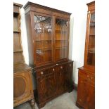 A George III style mahogany bookcase/display cabinet