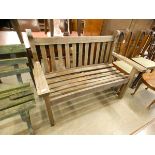 A teak garden bench