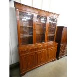 A George III style yew wood bookcase