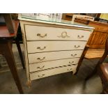 A French style cream and parcel gilt chest of drawers