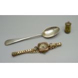 A 9ct gold cased Rotary wristwatch, a/f, a silver spoon and a silver £1 charm