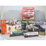 An Airfix Jaguar E-Type, an Airfix Helicopter Support set, a Revell Styracosaurus set and two