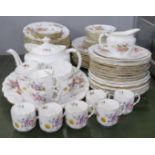 A collection of Royal Crown Derby Derby Posies dinner and teaware, including eleven dinner plates,