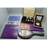 A silver mirror, a/f, a silver Titanic Expedition 2000 medallion and other mint coin sets