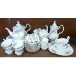 A Royal Albert Moss Rose six setting tea and dinner service, eight setting, 49 pieces in total **