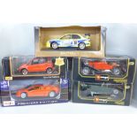 Five 18th scale model vehicles, boxed, including Burago, Mercedes Benz SSKL and Auto Art Toyota