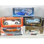 Five 18th scale model vehicles, boxed, including Burago, Lancia and Tonka Polistil MG A