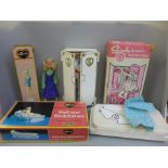 A Sindy bed and bed clothes, wardrobe and Funtime doll with accessories