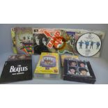 A collection of The Beatles 7" singles, CDs, VHS video & Magical Mystery Tour and a Band Aid single