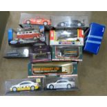 A collection of Corgi and other model vehicles including rally cars, boxed