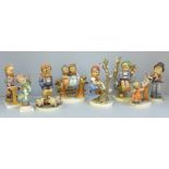 Eight Hummel figures including Bird Duet, Boy and Piglets, Apple Tree Boy, Girl on Tree, Apple