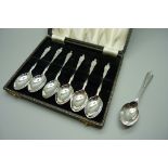 A set of six silver apostle spoons and one other silver spoon, boxed, 96g