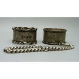 Two silver napkin rings and a silver bracelet, 73g