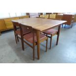 A Dalescraft teak extending dining table and four chairs, designed by Malcolm Walker