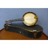 A Bell Tone banjo, cased