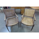 A pair of French walnut bergere library chairs