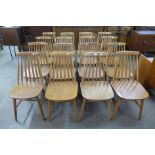 A set of sixteen Scandinavian beech chairs