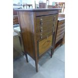 An Edward VII inlaid mahogany music cabinet